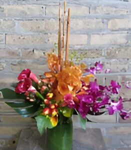 Flower arrangement in a green vase.