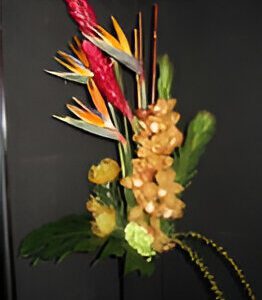 Tropical floral arrangement with vibrant blooms.