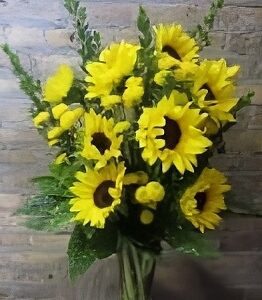 Bouquet of sunflowers in a glass vase.